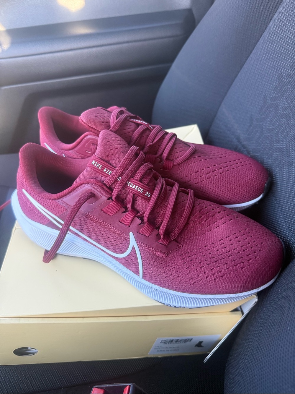 Nike Women's Burgundy Athletic Running Shoes with White Swoosh